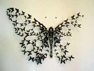 butterfly made out of crushed beer cans